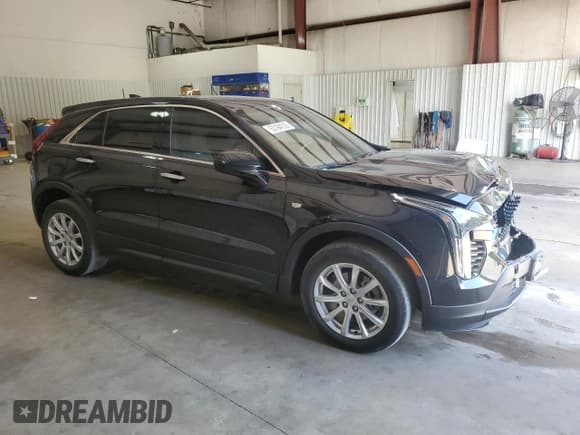 ✅ 2022 Cadillac XT4 FWD Luxury • VIN: 1GYAZAR45NF124737 • Lot: 53164135. Listed on Copart with 41,344 mi. Free auction sales archive from the USA and detailed vehicle history report at DreamBid. Image 4.