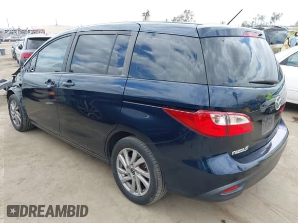 ✅ 2014 Mazda 5 Sport • VIN: JM1CW2BL1E0176111 • Lot: 42060863. Listed on IAAI with 121,814 mi. Free auction sales archive from the USA and detailed vehicle history report at DreamBid. Image 3.