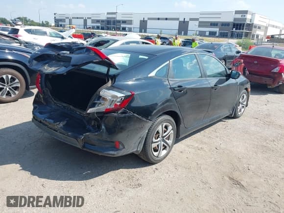 ✅ 2016 Honda Civic LX • VIN: 19XFC2F53GE041644 • Lot: 43239865. Listed on IAAI with 111,817 mi. Free auction sales archive from the USA and detailed vehicle history report at DreamBid. Image 4.