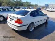 ✅ 2003 BMW 3 Series 325i • VIN: WBAET37423NJ23603 • Lot: 43686324. Listed on IAAI with 177,664 mi. Free auction sales archive from the USA and detailed vehicle history report at DreamBid. Image 4.