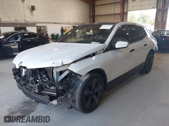 ✅ 2025 BMW iX xDrive50 • VIN: WB523CF08SCS46185 • Lot: 42779372. Listed on IAAI with 13,086 mi. Free auction sales archive from the USA and detailed vehicle history report at DreamBid. Image 2.
