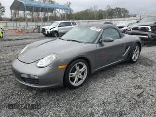 ✅ 2007 Porsche Boxster • VIN: WP0CA29857U711677 • Лот: 79859924. Опубликован ранее на Copart с пробегом 83 123 миль. Бесплатный доступ к архиву аукционных продаж из США и подробный отчёт об истории автомобиля на DreamBid. Изображение 1.