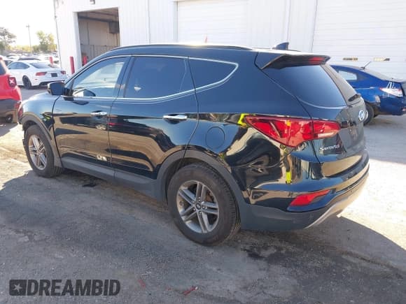 ✅ 2017 Hyundai Santa Fe 2.4L • VIN: 5XYZUDLB4HG448733 • Lot: 43522113. Listed on IAAI with 156,802 mi. Free auction sales archive from the USA and detailed vehicle history report at DreamBid. Image 3.