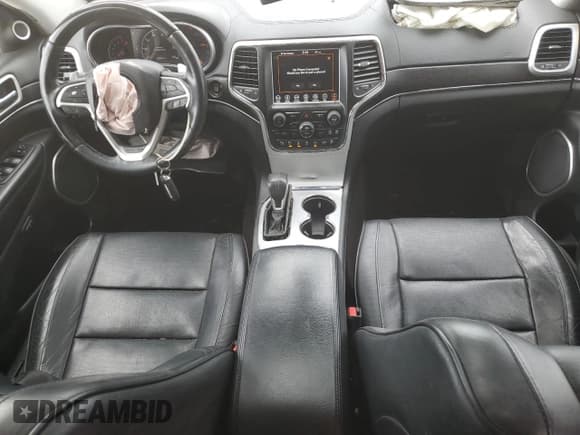 ✅ 2018 Jeep Grand Cherokee Summit • VIN: 1C4RJFJGXJC347502 • Lot: 52486975. Listed on Copart with 100,503 mi. Free auction sales archive from the USA and detailed vehicle history report at DreamBid. Image 8.