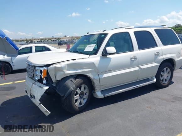 ✅ 2005 Cadillac Escalade • VIN: 1GYEC63T65R154327 • Lot: 42286355. Wystawiony na IAAI z przebiegiem Nie podano. Bezpłatny archiwum sprzedaży aukcyjnych z USA i szczegółowy raport historii pojazdu na DreamBid. Zdjęcie 2.