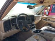 ✅ 2003 Chevrolet Suburban LT • VIN: 1GNEC16Z83J191651 • Лот: 42309641. Опубликован ранее на IAAI с пробегом Не указан. Бесплатный доступ к архиву аукционных продаж из США и подробный отчёт об истории автомобиля на DreamBid. Изображение 13.