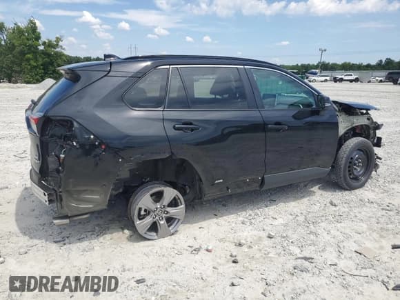 ✅ 2023 Toyota RAV4 Hybrid XLE • VIN: 4T3RWRFV6PU093769 • Lot: 63610005. Listed on Copart with 36,306 mi. Free auction sales archive from the USA and detailed vehicle history report at DreamBid. Image 3.