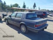 ✅ 1990 Dodge Dynasty • VIN: 1B3XC4639LD800339 • Lot: 42624306. Listed on IAAI with 66,804 mi. Free auction sales archive from the USA and detailed vehicle history report at DreamBid. Image 3.