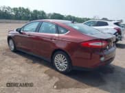 ✅ 2016 Ford Fusion S Hybrid • VIN: 3FA6P0UU7GR405548 • Лот: 42431290. Опубликован ранее на IAAI с пробегом 120 263 миль. Бесплатный доступ к архиву аукционных продаж из США и подробный отчёт об истории автомобиля на DreamBid. Изображение 3.