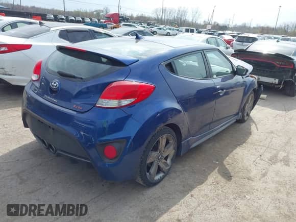 2015 Hyundai Veloster Turbo R-Spec z VIN KMHTC6AE1FU241628, wystawiony jako IAAI lot #42013008 z przebiegiem 110 357 mil mil oraz . Historia ofert i sprzedaży dostępna na DreamBid. Obrazek 4.