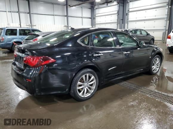 ✅ 2015 Infiniti Q70 • VIN: JN1BY1AR2FM560787 • Лот: 48898195. Опубликован ранее на Copart с пробегом 104 482 миль. Бесплатный доступ к архиву аукционных продаж из США и подробный отчёт об истории автомобиля на DreamBid. Изображение 3.