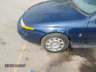 ✅ 2001 Saturn L • VIN: 1G8JT54F21Y557142 • Лот: 42192882. Опубликован ранее на IAAI с пробегом Не указан. Бесплатный доступ к архиву аукционных продаж из США и подробный отчёт об истории автомобиля на DreamBid. Изображение 6.