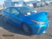 ✅ 2021 Toyota Prius LE • VIN: JTDL9MFU3M3030487 • Lot: 43849482. Listed on IAAI with 33,543 mi. Free auction sales archive from the USA and detailed vehicle history report at DreamBid. Image 1.