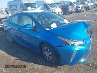 ✅ 2021 Toyota Prius LE • VIN: JTDL9MFU3M3030487 • Lot: 43849482. Listed on IAAI with 33,543 mi. Free auction sales archive from the USA and detailed vehicle history report at DreamBid. Image 1.