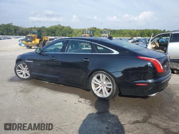 ✅ 2014 Jaguar XJ Portfolio • VIN: SAJWA2GZ1E8V61311 • Lot: 81485885. Listed on Copart with 133,168 mi. Free auction sales archive from the USA and detailed vehicle history report at DreamBid. Image 2.