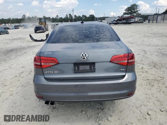 ✅ 2015 Volkswagen Jetta SE • VIN: 3VWD07AJ8FM318503 • Lot: 82072295. Listed on Copart with 77,037 mi. Free auction sales archive from the USA and detailed vehicle history report at DreamBid. Image 6.
