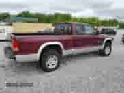 2002 Dodge Dakota SLT with VIN 1B7GG42N72S684370, listed as a Copart auction lot 57471025 with 112,424 mi miles and Clean title. Bid and sale history available at DreamBid. Image 3.