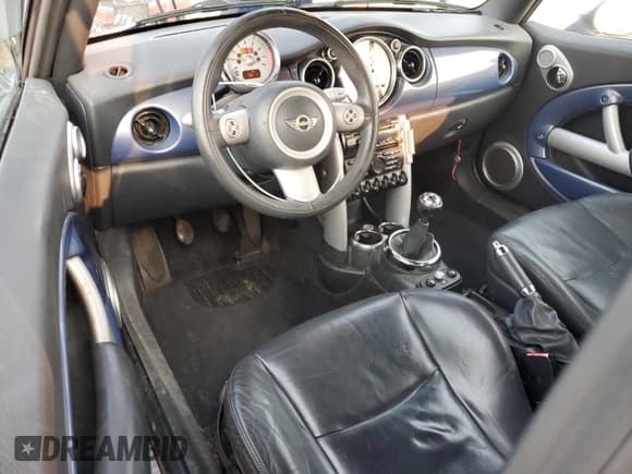 ✅ 2005 MINI Convertible • VIN: WMWRF33445TF61474 • Lot: 71482435. Wystawiony na Copart z przebiegiem 207 430 mil. Bezpłatny archiwum sprzedaży aukcyjnych z USA i szczegółowy raport historii pojazdu na DreamBid. Zdjęcie 8.