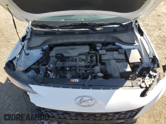 ✅ 2022 Hyundai Kona SEL • VIN: KM8K62AB6NU912453 • Лот: 69977724. Опубликован ранее на Copart с пробегом 22 235 миль. Бесплатный доступ к архиву аукционных продаж из США и подробный отчёт об истории автомобиля на DreamBid. Изображение 13.