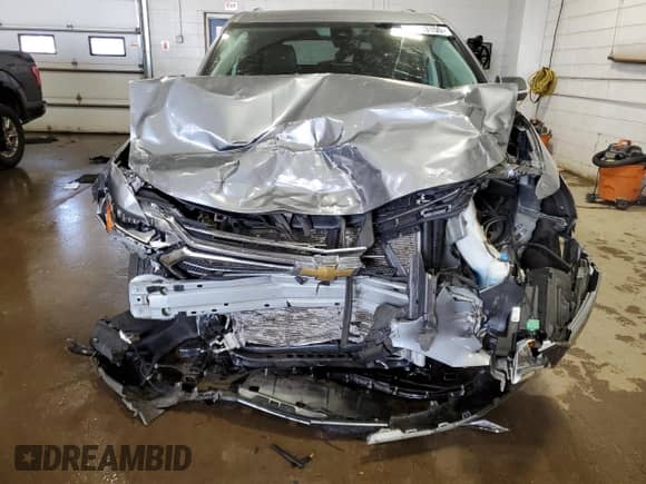 2021 Chevrolet Traverse Premier z VIN 1GNEVKKW1MJ169584, wystawiony jako Copart lot #70553155 z przebiegiem 51 297 mil mil oraz Szkoda całkowita • Salvage title. Historia ofert i sprzedaży dostępna na DreamBid. Obrazek 5.