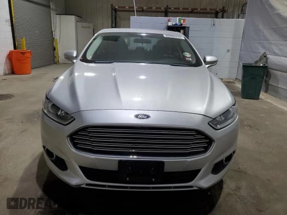 ✅ 2016 Ford Fusion SE Hybrid • VIN: 3FA6P0LUXGR321788 • Lot: 80886235. Wystawiony na Copart z przebiegiem 117 385 mil. Bezpłatny archiwum sprzedaży aukcyjnych z USA i szczegółowy raport historii pojazdu na DreamBid. Zdjęcie 5.