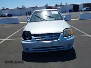 2004 Hyundai Accent GL z VIN KMHCG35C14U314148, wystawiony jako IAAI lot #42080238 z przebiegiem 123 584 mil mil oraz . Historia ofert i sprzedaży dostępna na DreamBid. Obrazek 6.