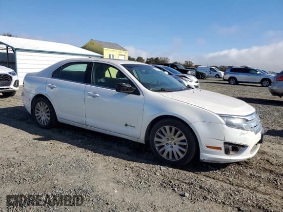 ✅ 2010 Ford Fusion Hybrid • VIN: 3FADP0L3XAR344428 • Lot: 92108485. Wystawiony na Copart z przebiegiem 175 446 mil. Bezpłatny archiwum sprzedaży aukcyjnych z USA i szczegółowy raport historii pojazdu na DreamBid. Zdjęcie 4.