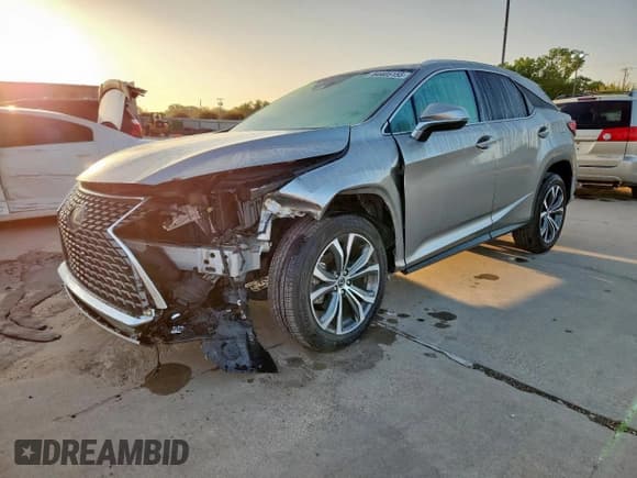 ✅ 2021 Lexus RX 350 • VIN: 2T2HZMAA7MC197022 • Лот: 64405155. Опубликован ранее на Copart с пробегом 34 556 миль. Бесплатный доступ к архиву аукционных продаж из США и подробный отчёт об истории автомобиля на DreamBid. Изображение 1.