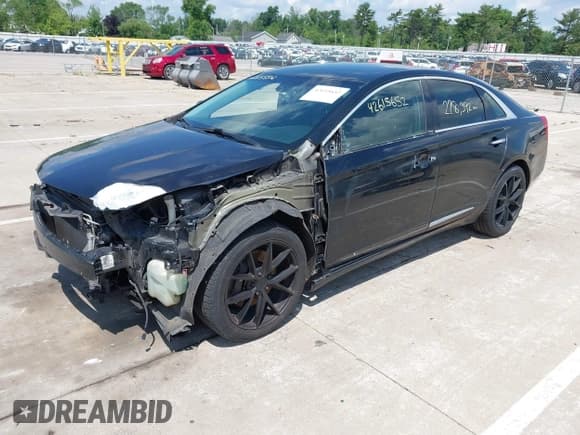 ✅ 2014 Cadillac XTS Livery • VIN: 2G61U5S39E9326134 • Lot: 42615652. Listed on IAAI with 228,392 mi. Free auction sales archive from the USA and detailed vehicle history report at DreamBid. Image 2.