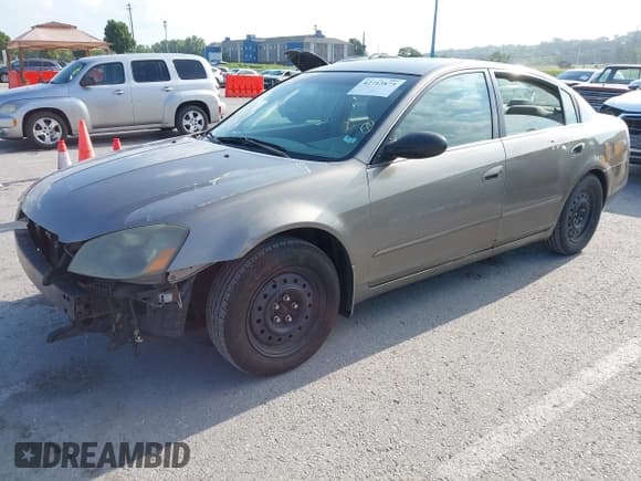 ✅ 2005 Nissan Altima 2.5 • VIN: 1N4AL11D25N431927 • Lot: 42712873. Listed on IAAI with 216,927 mi. Free auction sales archive from the USA and detailed vehicle history report at DreamBid. Image 17.
