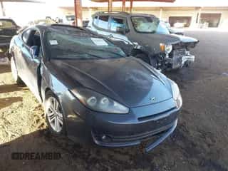 2008 Hyundai Tiburon GS z VIN KMHHM66D58U285136, wystawiony jako IAAI lot #41106382 z przebiegiem Nie podano mil oraz . Historia ofert i sprzedaży dostępna na DreamBid. Obrazek 1.