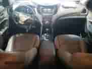 2017 Hyundai Santa Fe 2.0T z VIN 5XYZUDLA2HG435261, wystawiony jako Copart lot #68190485 z przebiegiem 125 513 mil mil oraz Szkoda całkowita • Salvage title. Historia ofert i sprzedaży dostępna na DreamBid. Obrazek 8.