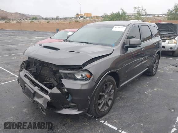 2018 Dodge Durango R/T with VIN 1C4SDHCT8JC100591, listed as a IAAI auction lot 43296025 with 95,326 mi miles and . Bid and sale history available at DreamBid. Image 18.