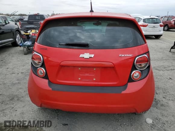 ✅ 2014 Chevrolet Sonic LS • VIN: 1G1JA6SG5E4125521 • Lot: 84605765. Listed on Copart with 89,219 mi. Free auction sales archive from the USA and detailed vehicle history report at DreamBid. Image 6.