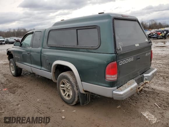 ✅ 1999 Dodge Dakota SLT • VIN: 1B7GG22X4XS309050 • Lot: 82030864. Wystawiony na Copart z przebiegiem 141 396 mil. Bezpłatny archiwum sprzedaży aukcyjnych z USA i szczegółowy raport historii pojazdu na DreamBid. Zdjęcie 2.