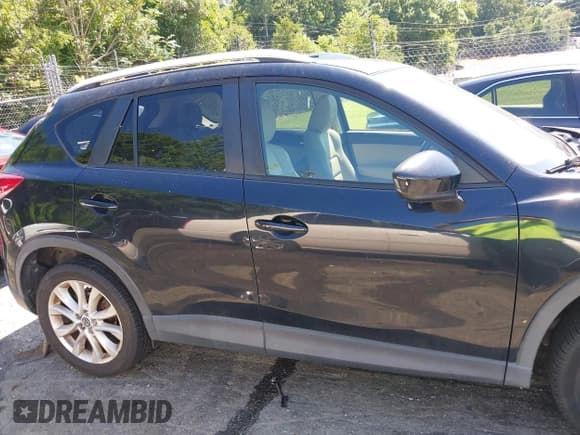 ✅ 2014 Mazda CX-5 Grand Touring • VIN: JM3KE2DY3E0339601 • Lot: 42652114. Wystawiony na IAAI z przebiegiem 153 063 mil. Bezpłatny archiwum sprzedaży aukcyjnych z USA i szczegółowy raport historii pojazdu na DreamBid. Zdjęcie 13.