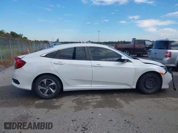 ✅ 2021 Honda Civic LX • VIN: 2HGFC2F63MH509186 • Lot: 43470365. Listed on IAAI with 81,122 mi. Free auction sales archive from the USA and detailed vehicle history report at DreamBid. Image 13.