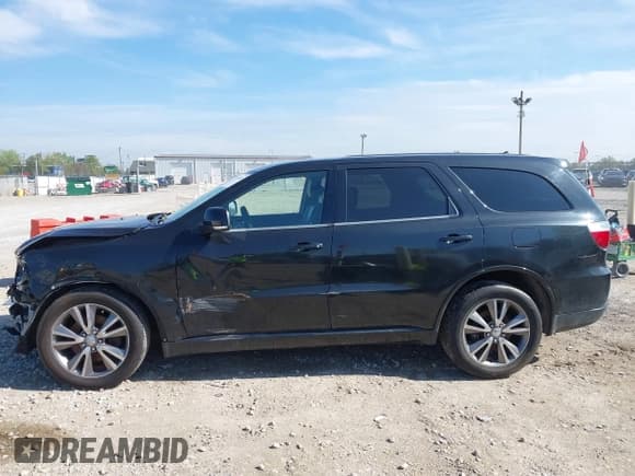 ✅ 2013 Dodge Durango R/T • VIN: 1C4SDJCT5DC665912 • Lot: 42199314. Listed on IAAI with 206,069 mi. Free auction sales archive from the USA and detailed vehicle history report at DreamBid. Image 15.