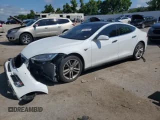✅ 2015 Tesla Model S 85 • VIN: 5YJSA1S12FFP65836 • Лот: 63587405. Опубликован ранее на Copart с пробегом Не указан. Бесплатный доступ к архиву аукционных продаж из США и подробный отчёт об истории автомобиля на DreamBid. Изображение 1.
