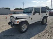 ✅ 1998 Jeep Wrangler Sahara • VIN: 1J4FY49S2WP702801 • Lot: 68619885. Wystawiony na Copart z przebiegiem 109 770 mil. Bezpłatny archiwum sprzedaży aukcyjnych z USA i szczegółowy raport historii pojazdu na DreamBid. Zdjęcie 1.