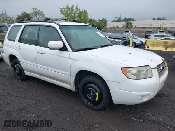✅ 2007 Subaru Forester X • VIN: JF1SG65667H710736 • Lot: 43244105. Listed on IAAI with 199,681 mi. Free auction sales archive from the USA and detailed vehicle history report at DreamBid. Image 1.