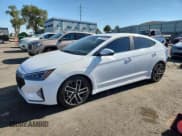 ✅ 2019 Hyundai Elantra Sport • VIN: KMHD04LB5KU837985 • Lot: 70855405. Listed on Copart with 50,268 mi. Free auction sales archive from the USA and detailed vehicle history report at DreamBid. Image 1.