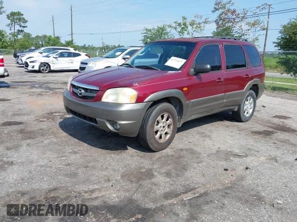 ✅ 2004 Mazda Tribute LX • VIN: 4F2YZ94164KM08982 • Lot: 42792071. Listed on IAAI with 219,642 mi. Free auction sales archive from the USA and detailed vehicle history report at DreamBid. Image 17.