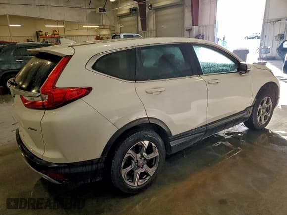 ✅ 2017 Honda CR-V EX • VIN: 5J6RW2H55HL064766 • Лот: 92501095. Опубликован ранее на Copart с пробегом 104 570 миль. Бесплатный доступ к архиву аукционных продаж из США и подробный отчёт об истории автомобиля на DreamBid. Изображение 3.