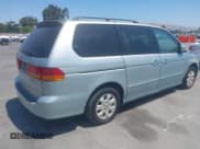 ✅ 2002 Honda Odyssey EX-L • VIN: 2HKRL18922H582311 • Lot: 42982093. Wystawiony na IAAI z przebiegiem 232 426 mil. Bezpłatny archiwum sprzedaży aukcyjnych z USA i szczegółowy raport historii pojazdu na DreamBid. Zdjęcie 4.