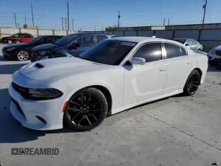 ✅ 2021 Dodge Charger GT • VIN: 2C3CDXHG3MH569412 • Lot: 86542435. Wystawiony na Copart z przebiegiem 96 017 mil. Bezpłatny archiwum sprzedaży aukcyjnych z USA i szczegółowy raport historii pojazdu na DreamBid. Zdjęcie 1.