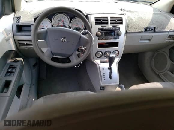 2007 Dodge Caliber SXT z VIN 1B3HB48B27D564683, wystawiony jako Copart lot #73495424 z przebiegiem 88 463 mil mil oraz Nie do naprawy • Non repairable. Historia ofert i sprzedaży dostępna na DreamBid. Obrazek 8.