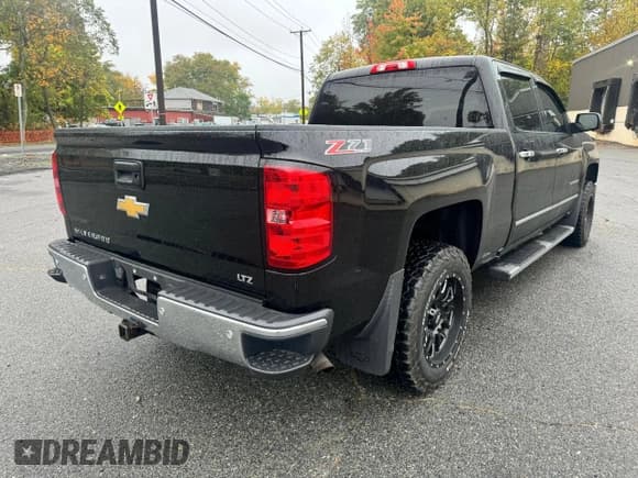 ✅ 2014 Chevrolet Silverado 1500 LTZ • VIN: 3GCUKSEC4EG358120 • Лот: 76415144. Опубликован ранее на Copart с пробегом 144 448 миль. Бесплатный доступ к архиву аукционных продаж из США и подробный отчёт об истории автомобиля на DreamBid. Изображение 4.