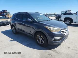 ✅ 2017 Hyundai Santa Fe 2.4L • VIN: 5NMZU3LBXHH011318 • Лот: 89848685. Опубликован ранее на Copart с пробегом 121 332 миль. Бесплатный доступ к архиву аукционных продаж из США и подробный отчёт об истории автомобиля на DreamBid. Изображение 4.