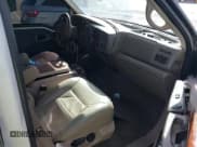 ✅ 2001 Ford Excursion Limited • VIN: 1FMNU42S71EB51742 • Lot: 41671340. Listed on IAAI with 209,606 mi. Free auction sales archive from the USA and detailed vehicle history report at DreamBid. Image 5.